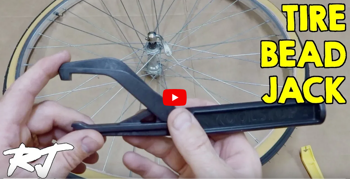 Load video: How To Get Tight Tire On Bike Wheel Rim With Tire Bead Jack